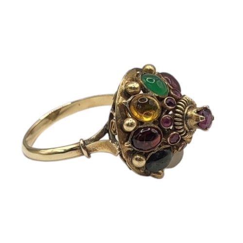 47 - A VINTAGE 14CT GOLD AND MULTI GEM SET TUTTI FRUTTI RING
Having an arrangement of cabochon cut stones... 