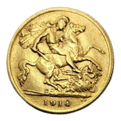 47A - AN EARLY 20TH CENTURY 22CT GOLD HALF SOVEREIGN COIN, DATED 1914 
With King George V portrait bust an... 