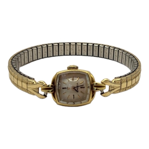 55 - OMEGA, A VINTAGE 18CT GOLD LADIES’ COCKTAIL WATCH
The square silver tone dial with mechanical moveme... 