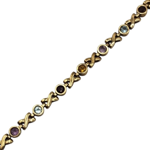 59 - A VINTAGE 9CT GOLD AND GEM SET BRACELET
Cruciform links set with round cut garnet and amethyst stone... 