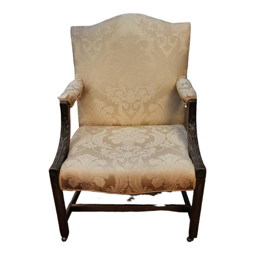 607 - AN 18TH CENTURY MAHOGANY OPEN ARMCHAIR
With acanthus carved show wood arms, later floral cream fabri... 