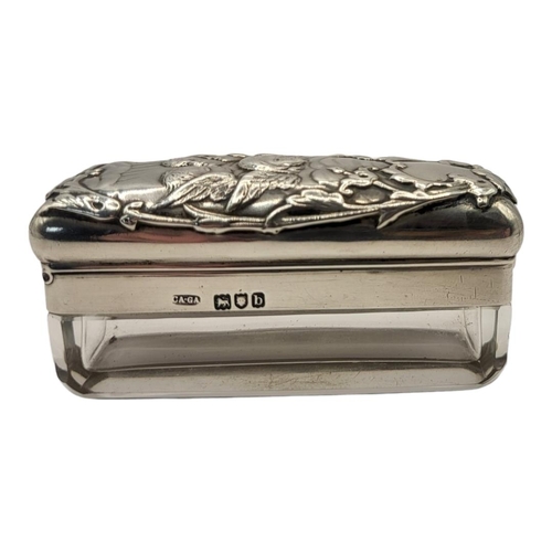 61 - ASPREY, A VICTORIAN SILVER AND GLASS RECTANGULAR TRINKET BOX
With embossed figural hinged lid, hallm... 