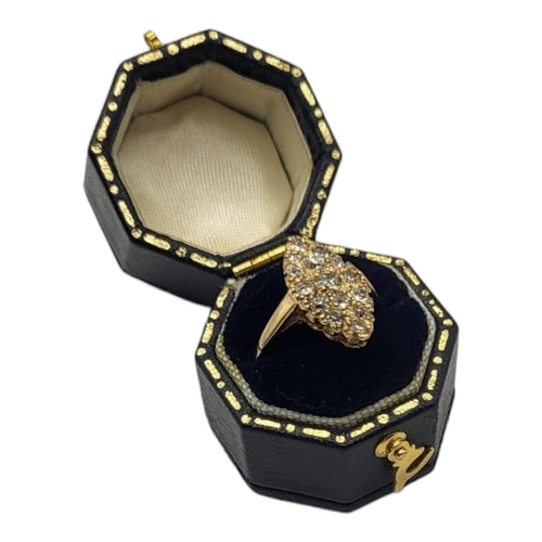 82 - A VINTAGE 18CT GOLD AND DIAMOND CLUSTER RING
Having an arrangement of round cut stones forming a loz... 