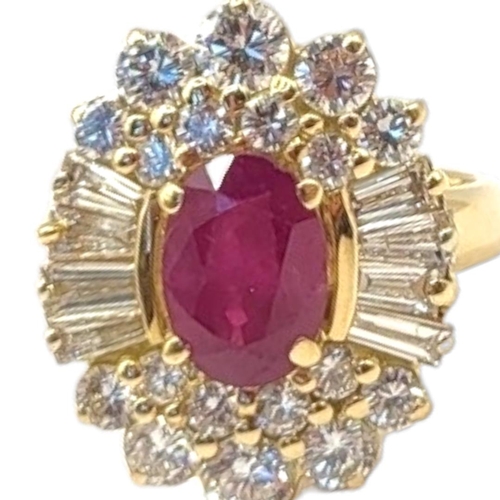 8A - A VINTAGE 18CT GOLD, RUBY AND DIAMOND CLUSTER RING
The central oval cut ruby in an arrangement of ba... 