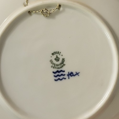 197A - ROYAL COPENHAGEN, A COLLECTION OF FOUR EARLY BLUE AND WHITE CHRISTMAS PLATES
Consisting of 1912, 191... 