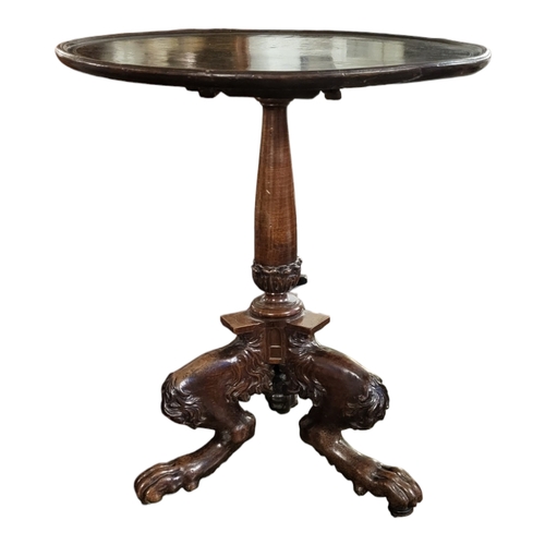 617 - AN EARLY 19TH CENTURY SOLID MAHOGANY TILT TOP OCCASIONAL TABLE, the circular dish top raised on a si... 