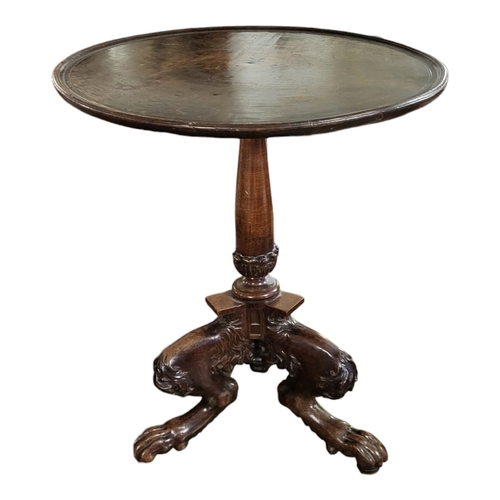 617 - AN EARLY 19TH CENTURY SOLID MAHOGANY TILT TOP OCCASIONAL TABLE, the circular dish top raised on a si... 