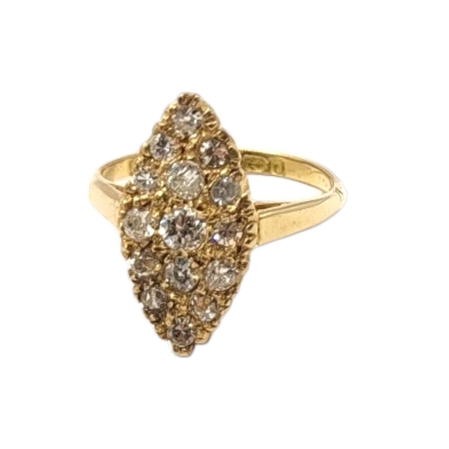 50 - A VINTAGE 18CT GOLD AND DIAMOND CLUSTER RING
Having an arrangement of round cut stones forming a loz... 