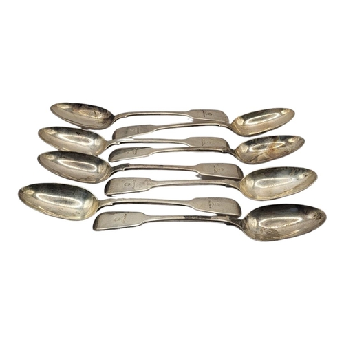 1 - A SET OF EIGHT GEORGIAN SILVER TABLESPOONS
Plain fiddle pattern with engraved family crest, hallmark... 