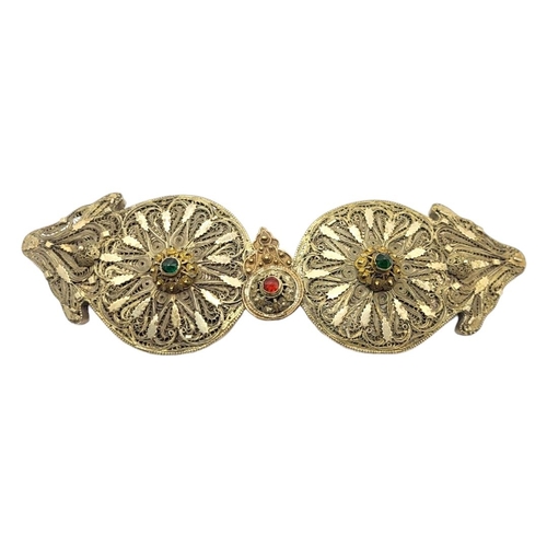 15 - A VINTAGE GREEK WHITE METAL IOANNINA BELT BUCKLE
Fine filigree work set with coloured glass stones.
... 