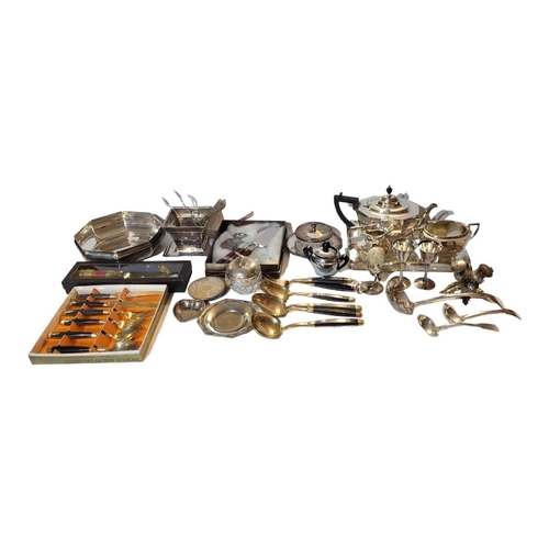 18 - A COLLECTION OF VINTAGE SILVER PLATED WARE
Comprising a three piece tea set, gallery tray, a bowl ma... 