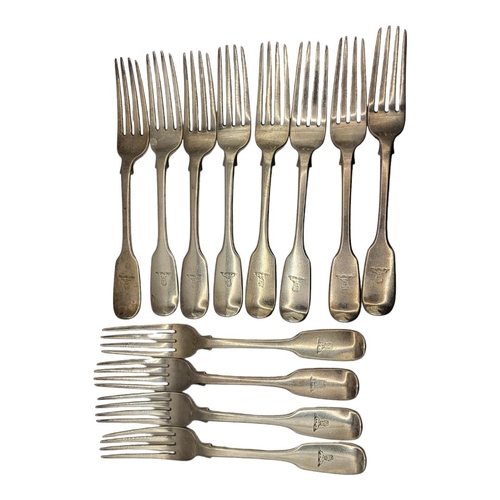 4 - A SET OF TWELVE GEORGIAN SILVER DINNER FORKS
Plain fiddle pattern with engraved family crest, hallma... 