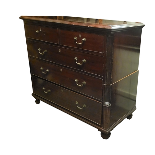 591 - A 19TH CENTURY MAHOGANY CHEST
With two short above three long drawers flanked by reeded columns, on ... 