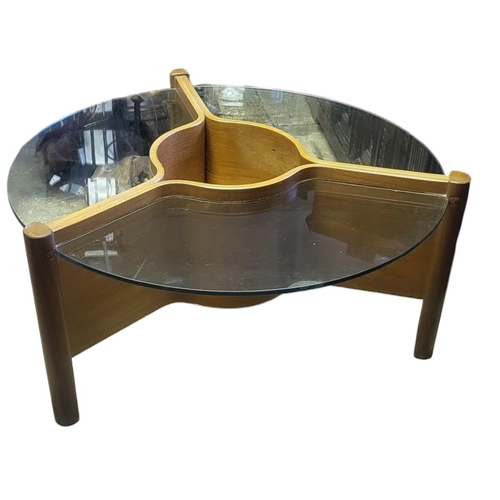 593 - A NATHAN COFFEE TABLE
In thermoformed wood and glass, Circa 1960s.
(d 97cm x w 94cm x h 49cm)

Condi... 