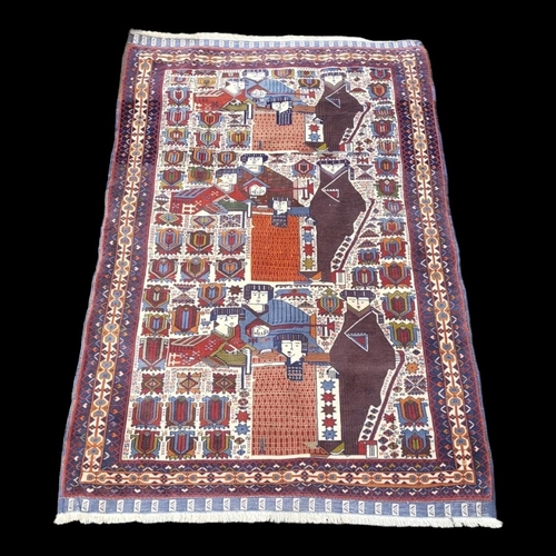 598 - A VINTAGE WOOLLEN BALOUCHI RUG
Woven with numerous figures and medallions contained in running borde... 