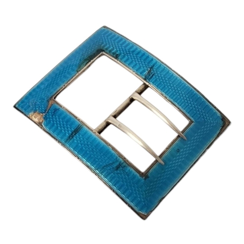 165 - AN EDWARDIAN LIBERTY & CO. SILVER BELT BUCKLE
Birmingham, 1908, with a blue turquoise enamel engine ... 