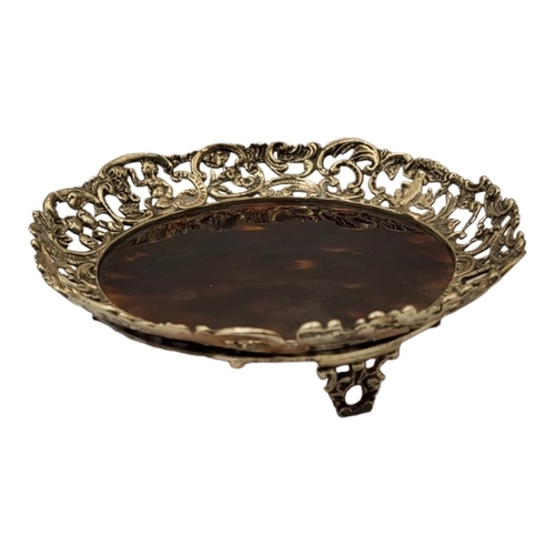 159 - WILLIAM COMYNS, A VICTORIAN SILVER AND TORTOISESHELL PIN TRAY
Having a pierced scrolled border with ... 