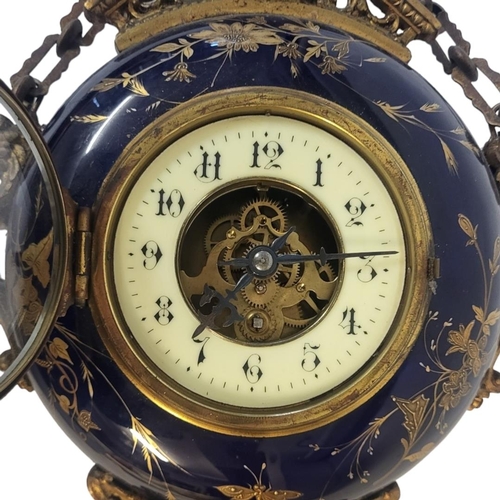 377 - EUGENE FARCOT, A 19TH CENTURY  FRENCH GILT METAL AND PORCELAIN WALL CLOCK
Having applied urn form fi... 