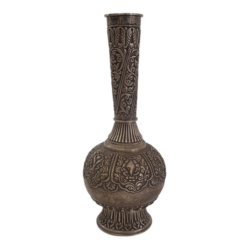 103 - A 19TH CENTURY ASIAN WHITE METAL ROSE WATER BOTTLE/VASE
Having fine embossed and chased decoration a... 