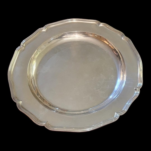 108 - A 20TH CENTURY AUSTRIAN  WHITE METAL CHARGER PLATE 
Having a reeded scrolled border and shallow bowl... 