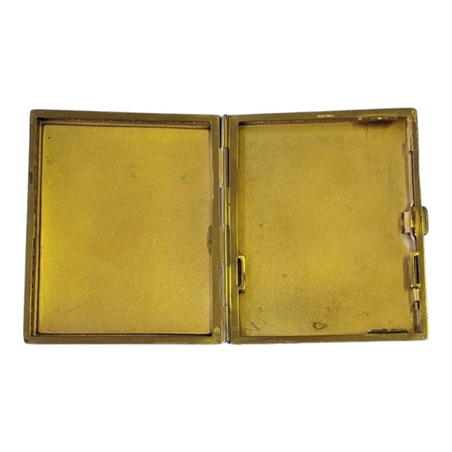 117 - AN EDWARDIAN GILT METAL AND ENAMEL CIGARETTE CASE
Black and white hunting dog within a Scottish land... 