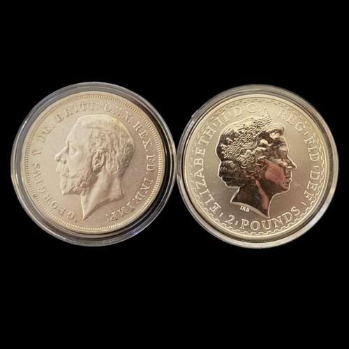 131 - AN EARLY 20TH CENTURY SILVER FULL CROWN COIN, DATED 1935 
With George V portrait and King George and... 