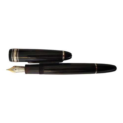 136 - MONTBLANC, A VINTAGE WHITE METAL AND BLACK LACQUER  FOUNTAIN PEN
14ct gold nib marked ‘4810’, white ... 