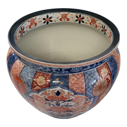 210 - A 19TH CENTURY JAPANESE IMARI PORCELAIN JARDINIÈRE
Hand painted decoration with floral motifs to arc... 