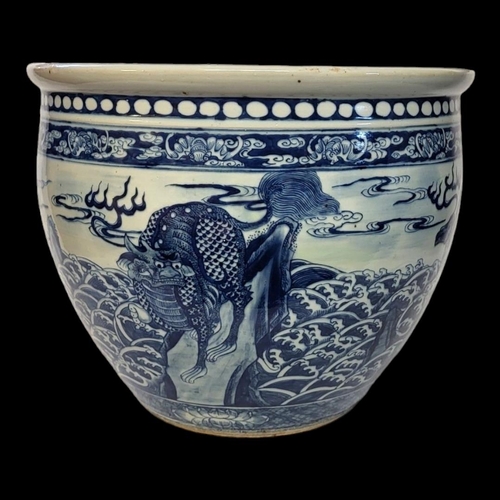 213 - A LATE 19TH/EARLY 20TH CENTURY CHINESE BLUE AND WHITE PORCELAIN FISH BOWL 
Hand painted with four dr... 