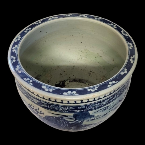 213 - A LATE 19TH/EARLY 20TH CENTURY CHINESE BLUE AND WHITE PORCELAIN FISH BOWL 
Hand painted with four dr... 