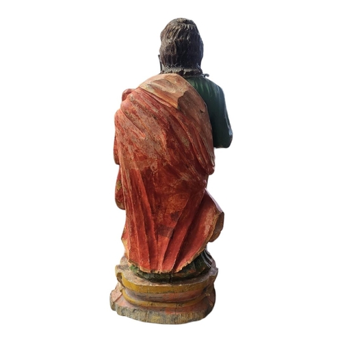 273 - A LATE 19TH CENTURY CENTRAL EUROPEAN CARVED WOOD, POLYCHROME DECORATED STATUE OF ST. JOSEPH MODELLED... 