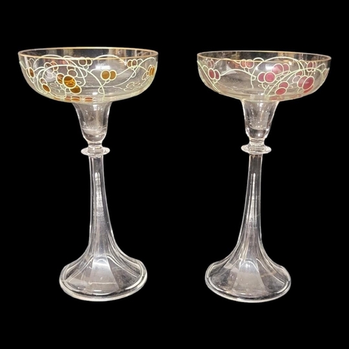 291 - FRITZ HECKERT, A SET OF THREE ART NOUVEAU GLASS CHAMPAGNE FLUTES
Decorated with berries, one pink an... 