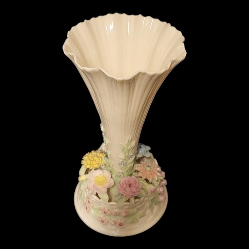 190 - BELLEEK, A 20TH CENTURY IRISH PORCELAIN TRUMPET VASE
The central reeded trumpet with applied floral ... 