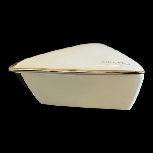 358 - LIMOGES, A VINTAGE PORCELAIN TRINKET BOX
Triangular form marked Carlo Pignatelli, bearing label to b... 