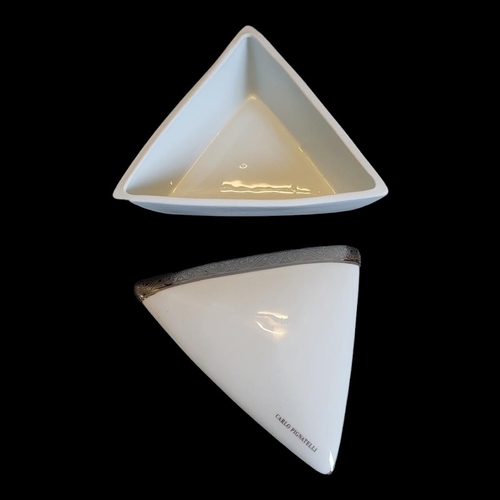 358 - LIMOGES, A VINTAGE PORCELAIN TRINKET BOX
Triangular form marked Carlo Pignatelli, bearing label to b... 