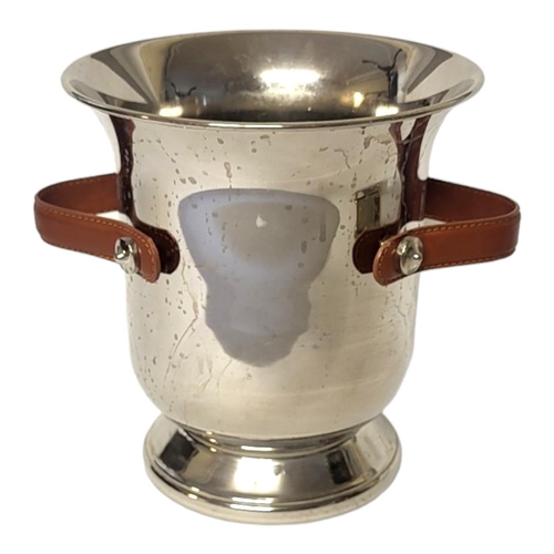 364 - A VINTAGE SILVER PLATE AND LEATHER CHAMPAGNE BUCKET
Twin brown leather handles and presentation insc... 