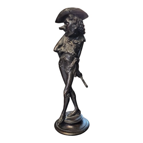 374 - A 19TH CENTURY FRENCH SPELTER FIGURAL CANDLESTICK OF CYRANO DE BERGERAC
A comical caricature in stan... 