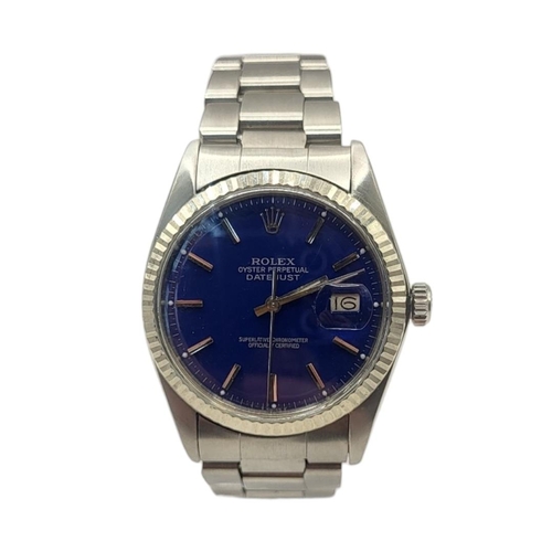 139 - ROLEX, DATEJUST, A VINTAGE STAINLESS STEEL GENT’S WRISTWATCH
Having an 18ct white gold bezel, blue t... 