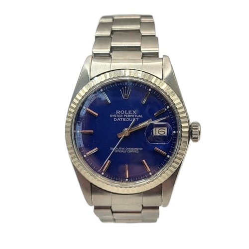 139 - ROLEX, DATEJUST, A VINTAGE STAINLESS STEEL GENT’S WRISTWATCH
Having an 18ct white gold bezel, blue t... 