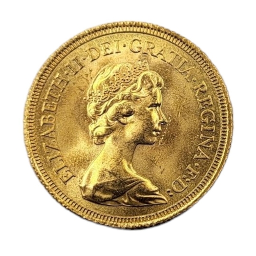 13A - A QUEEN ELIZABETH 22CT GOLD FULL SOVEREIGN COIN, DATED 1974 
With portrait bust and George and Drago... 