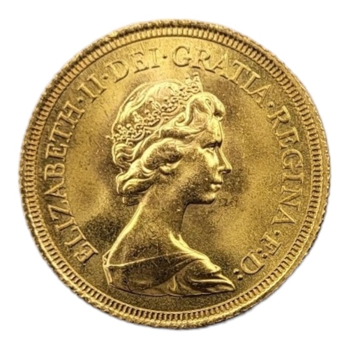 14A - A QUEEN ELIZABETH 22CT GOLD FULL SOVEREIGN COIN, DATED 1974 
With portrait bust and George and Drago... 