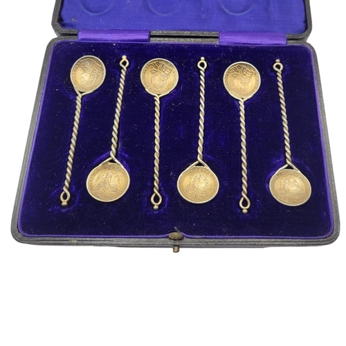 2 - A SET OF 18TH CENTURY GERMAN STATES SILVER GILT COIN SET TEASPOONS
Each set with a 1763 Augustus 11⅙... 