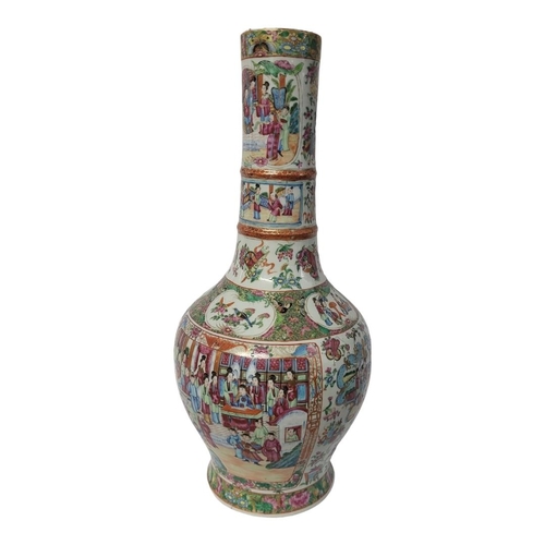 266 - A FINE CHINESE QING DYNASTY PORCELAIN CANTONESE EXPORT FAMILLE ROSE FIGURAL BOTTLE FORM VASE
Polychr... 