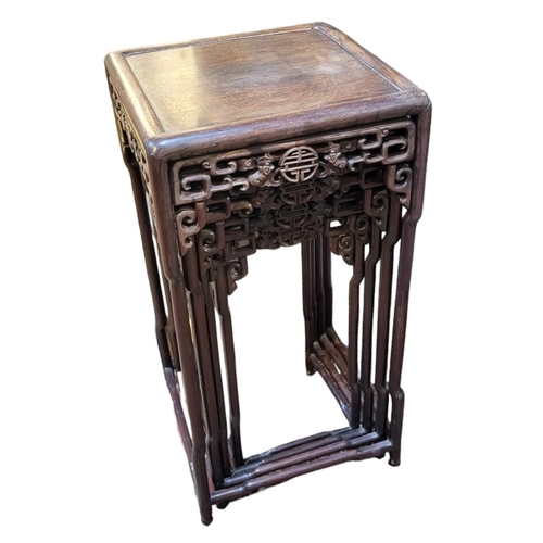 448 - A LATE 19TH CENTURY CHINESE ROSEWOOD NEST OF FOUR TABLES, CIRCA 1900
Plain design, with a rectangula... 