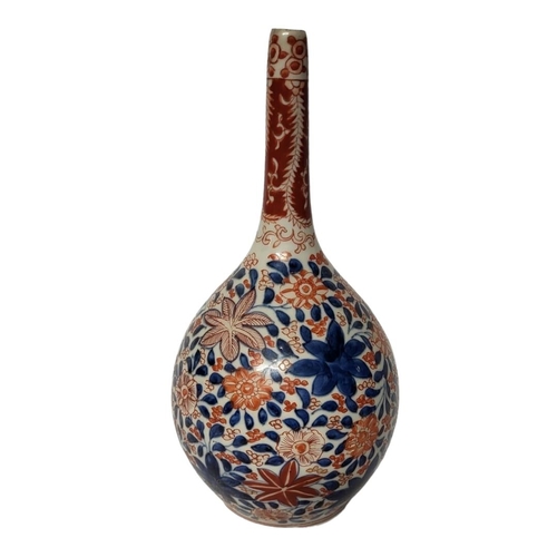 274 - AN 18TH CENTURY JAPANESE IMARI EDO-TOKUGAWA PERIOD, 1600 - 1868, WINE BOTTLE
The underglaze blue bod... 