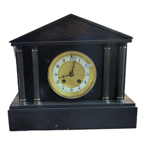 297 - A VICTORIAN BELGIAN SLATE MANTLE CLOCK
Architectural form with striking movement, complete with key.... 