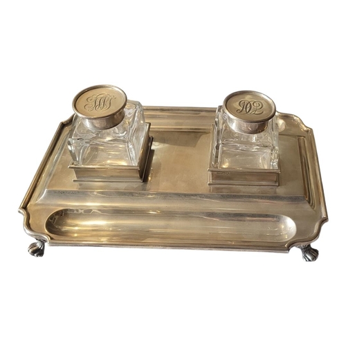 30 - ELKINGTON & CO., A LARGE VICTORIAN SILVER AND GLASS INKSTAND
Two square cut glass inkwells with hing... 