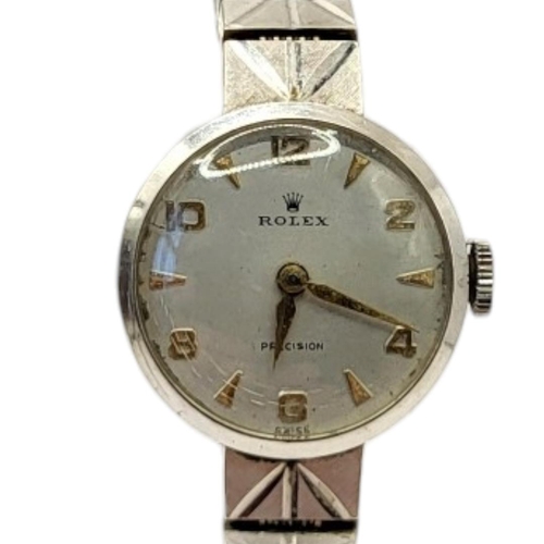 35 - ROLEX, PRECISION, A VINTAGE 9CT WHITE GOLD LADIES’ WRISTWATCH
Silver tone dial with Arabic quarter n... 