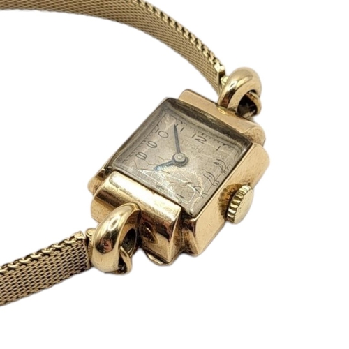 36 - GIRARD PERREGAUX, A VINTAGE 9CT GOLD LADIES’ WRISTWATCH
The square silver tone dial with Arabic mark... 