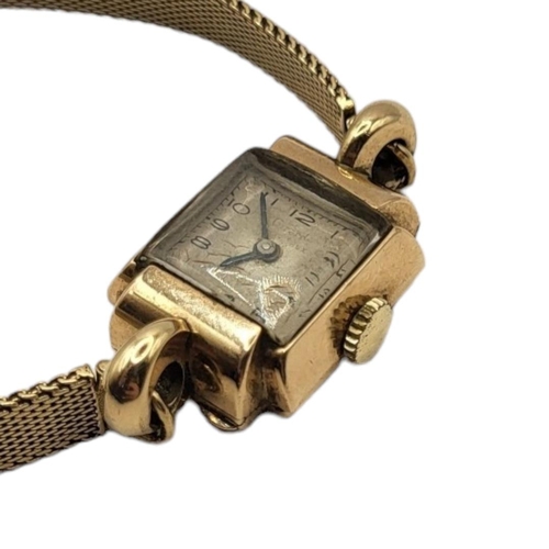 36 - GIRARD PERREGAUX, A VINTAGE 9CT GOLD LADIES’ WRISTWATCH
The square silver tone dial with Arabic mark... 